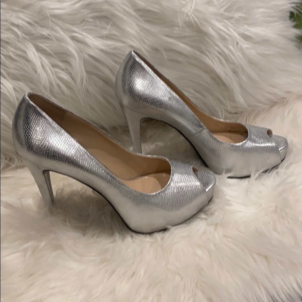 Guess Women’s silver, open toe, platform Heels - 8